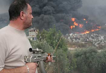 On guard: A militant watches over a no-go zone.