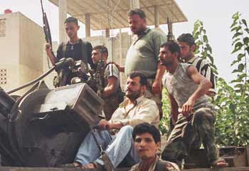 Anti-aircraft gun: these pictures were taken by a visiting journalist and smuggled out by a friend.
