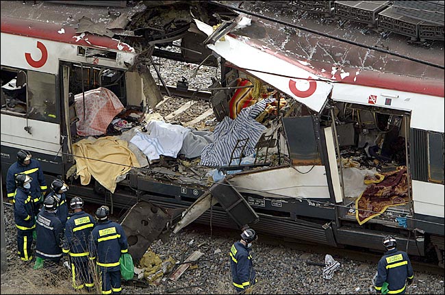 The blasts were so powerful that train cars were burst open and bodies of passengers were blown out into the roads.